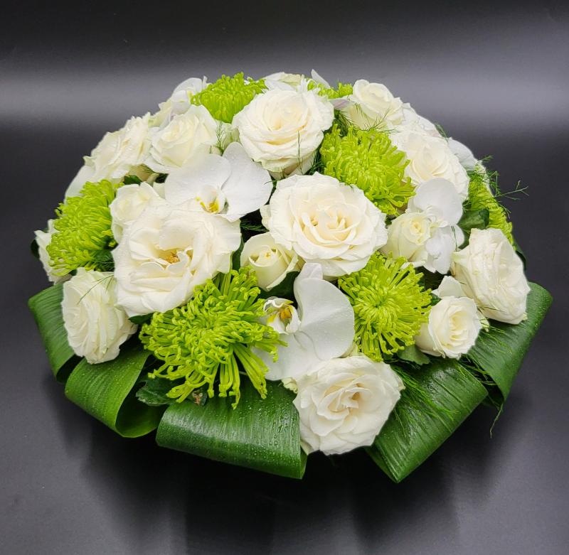 coussin rond serré blanc et vert